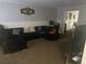 Spacious living room with sectional sofa at 6354 Shannon Pkwy # 12F, Union City, GA 30291