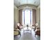 Sitting area with armchairs, coffee table and chandelier at 88 W Paces Ferry Nw Rd # 1130, Atlanta, GA 30305