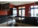 Modern kitchen featuring dark cabinetry and stainless steel appliances at 88 W Paces Ferry Nw Rd # 1130, Atlanta, GA 30305