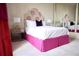 Bedroom with a floral headboard and pink bedskirt at 88 W Paces Ferry Nw Rd # 1130, Atlanta, GA 30305