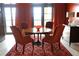 Small dining area with four chairs and a round wooden table at 88 W Paces Ferry Nw Rd # 1130, Atlanta, GA 30305