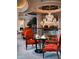 Lounge area with comfortable seating and a large chandelier at 88 W Paces Ferry Nw Rd # 1130, Atlanta, GA 30305