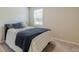 Bedroom with a queen-size bed and neutral-toned decor at 6912 Oak Valley Dr, Douglasville, GA 30134