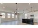 Bright dining area with hardwood floors and a chandelier at 261 Dahlia Dr, Woodstock, GA 30188