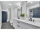 Modern bathroom with double vanity, updated fixtures, and dark gray accents at 2228 Old Dallas Sw Rd, Marietta, GA 30064