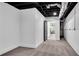 Unfinished basement area with exposed utilities and a door at 2228 Old Dallas Sw Rd, Marietta, GA 30064