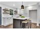 Modern kitchen island with white cabinets and quartz countertops at 2228 Old Dallas Sw Rd, Marietta, GA 30064