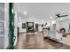 Open living space with hardwood floors and modern fireplace at 2228 Old Dallas Sw Rd, Marietta, GA 30064