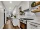 Modern kitchen with white cabinets, quartz countertops, and stainless steel appliances at 2228 Old Dallas Sw Rd, Marietta, GA 30064