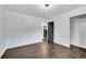 Light-filled bedroom featuring dark gray doors and hardwood floors at 2228 Old Dallas Sw Rd, Marietta, GA 30064
