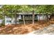 Charming ranch home with a newly renovated deck and landscaping at 2228 Old Dallas Sw Rd, Marietta, GA 30064