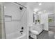 Clean bathroom with white subway tile, shower, and bathtub at 2228 Old Dallas Sw Rd, Marietta, GA 30064