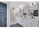Modern bathroom with white subway tile, dual vanity, and a large walk-in shower at 2228 Old Dallas Sw Rd, Marietta, GA 30064