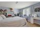 Spacious bedroom with a large bed and plenty of storage at 4693 Hairston Crossing Rd, Stone Mountain, GA 30083