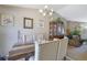Dining room with a wooden table and access to the living room at 4693 Hairston Crossing Rd, Stone Mountain, GA 30083