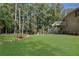 Landscaped backyard featuring a wooden footbridge at 4693 Hairston Crossing Rd, Stone Mountain, GA 30083