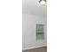Simple bedroom with a window and neutral wall color at 1586 Pressley Ln, Mcdonough, GA 30253