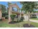 Brick two-story home with a two-car garage and front yard landscaping at 1586 Pressley Ln, Mcdonough, GA 30253