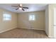 Bedroom with ceiling fan and neutral-toned carpet at 4323 Autumn Hill Dr, Stone Mountain, GA 30083