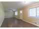 Spacious living room featuring hardwood floors and lots of natural light at 4323 Autumn Hill Dr, Stone Mountain, GA 30083