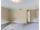 Bright and airy living room with neutral walls and carpet at 4323 Autumn Hill Dr, Stone Mountain, GA 30083