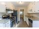 Eat-in kitchen with granite countertops and stainless steel appliances at 4323 Autumn Hill Dr, Stone Mountain, GA 30083