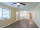Bright living room with hardwood floors and neutral color scheme at 4323 Autumn Hill Dr, Stone Mountain, GA 30083