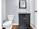 Small bathroom with single vanity, granite countertop and toilet at 3225 Fern Dr, Tucker, GA 30084