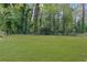 Large backyard with lush green grass at 3225 Fern Dr, Tucker, GA 30084