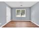 Well-lit bedroom with hardwood floors and neutral walls at 3225 Fern Dr, Tucker, GA 30084