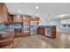 Modern kitchen with stainless steel appliances and dark wood cabinets at 3225 Fern Dr, Tucker, GA 30084