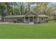 Single-story house with green lawn and covered porch at 3225 Fern Dr, Tucker, GA 30084