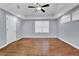 Spacious bedroom with hardwood floors and ceiling fan at 3225 Fern Dr, Tucker, GA 30084