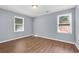 Bright bedroom with hardwood floors and neutral walls at 3225 Fern Dr, Tucker, GA 30084