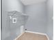Laundry room with wire shelving and tile floor at 3225 Fern Dr, Tucker, GA 30084
