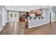 Open concept dining room with hardwood floors and kitchen access at 3225 Fern Dr, Tucker, GA 30084