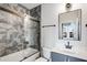 Bathroom with a modern bathtub and geometric patterned tiles at 1221 Cushenberry Ln, Atlanta, GA 30318