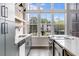 Modern kitchen with stainless steel appliances and large windows at 1221 Cushenberry Ln, Atlanta, GA 30318