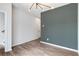 Spacious office with gray accent wall and wood-look floors at 1221 Cushenberry Ln, Atlanta, GA 30318