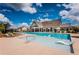 Community pool with lounge chairs and cabanas at 3351 Orwell Way # 2105, Cumming, GA 30041