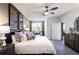 Spacious bedroom with king-size bed and access to balcony at 3351 Orwell Way # 2105, Cumming, GA 30041