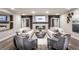 Community lounge with fireplace and comfortable seating at 3351 Orwell Way # 2105, Cumming, GA 30041