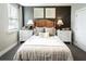 Cosy bedroom with wicker headboard and neutral tones at 3351 Orwell Way # 2105, Cumming, GA 30041