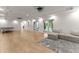 Finished basement with a large open space and access to the backyard at 2635 Camp Branch Rd, Buford, GA 30519
