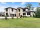 Luxury home with stone accents and a three-car garage at 2635 Camp Branch Rd, Buford, GA 30519