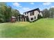 Luxury home with backyard, deck and landscaping at 2635 Camp Branch Rd, Buford, GA 30519