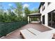 Relaxing deck with lounge chairs, offering a view of the backyard and trees at 2635 Camp Branch Rd, Buford, GA 30519