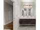 Double vanity bathroom with modern fixtures and large mirrors at 2635 Camp Branch Rd, Buford, GA 30519