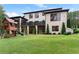 Luxury home with backyard, deck and landscaping at 2635 Camp Branch Rd, Buford, GA 30519