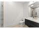 Modern bathroom with a walk-in shower and floating vanity at 2635 Camp Branch Rd, Buford, GA 30519